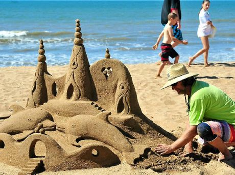 Sand castle with dolphins.  