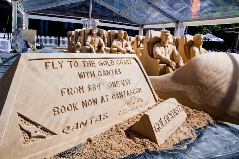 Qantas logo in sand for corporate sand sculpture event.