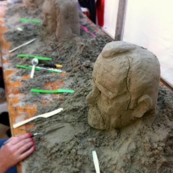 Learn to build a bust out of sand with our sand sculpting workshops.